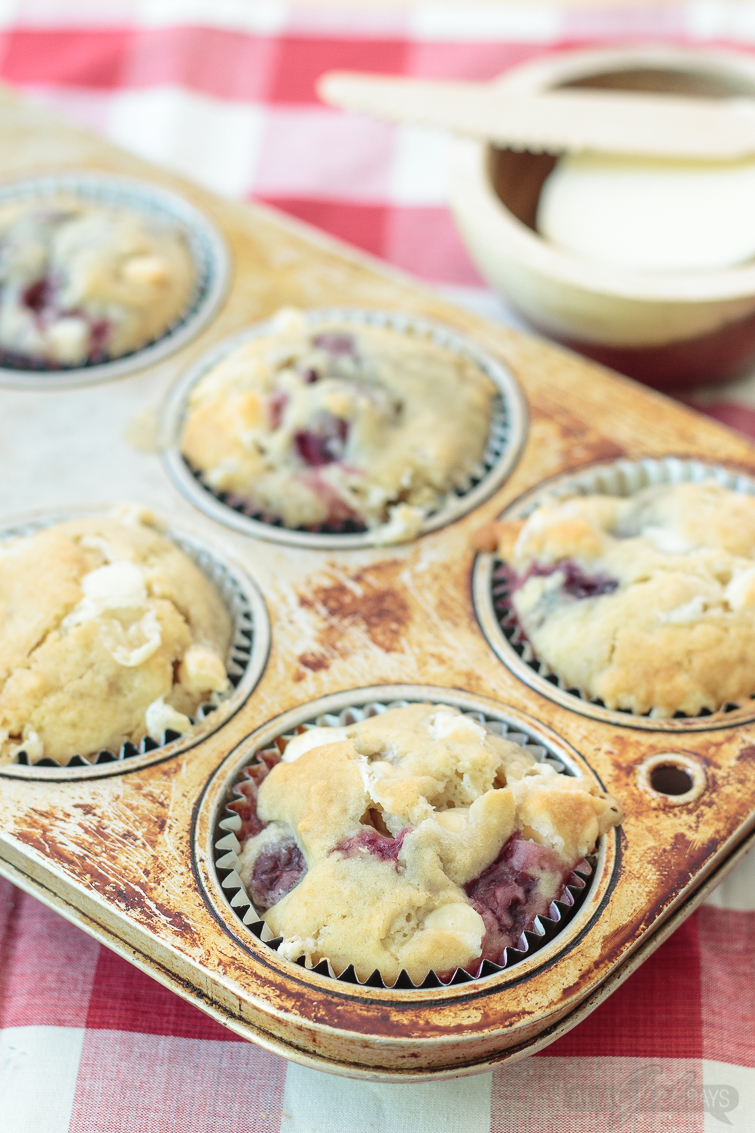 pan of white chocolate cherry muffins