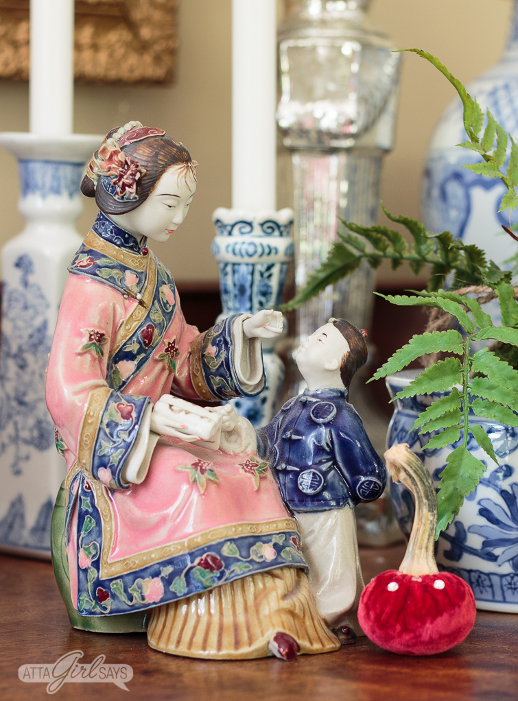 porcelain figurine of a Chinese mother and son