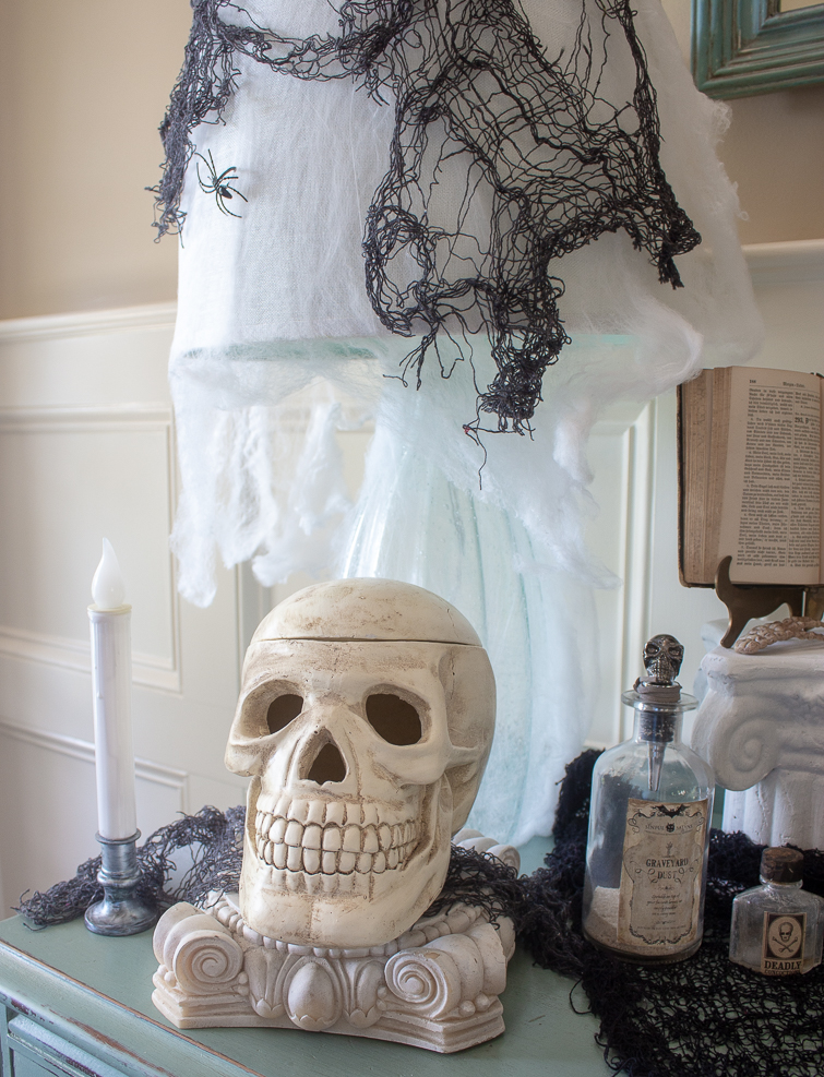 Halloween decorations on a vintage aqua blue buffett