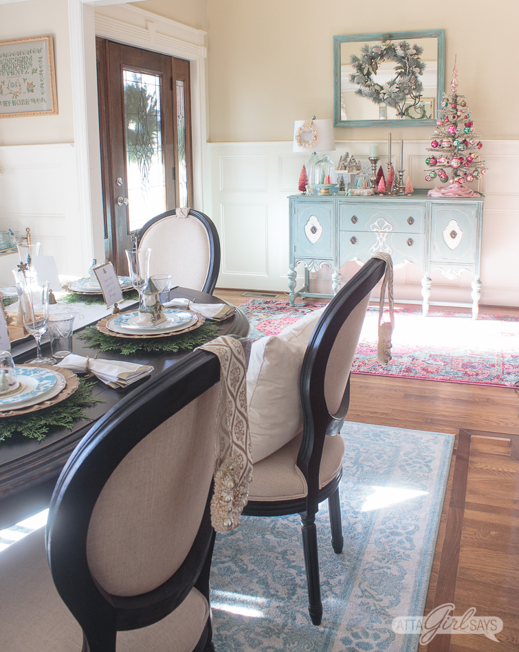 traditional foyer and dining room decorated for Christmas