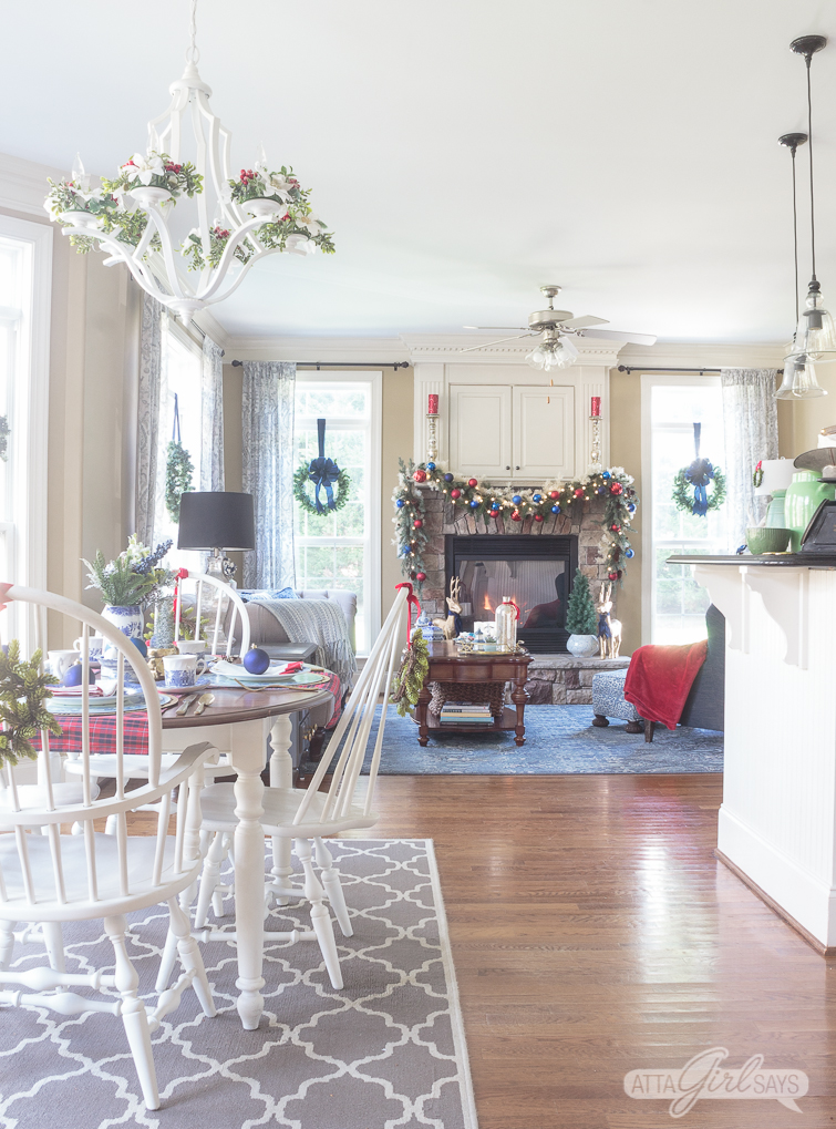 open concept family room and kitchen decorated in bleu and red for Christmas