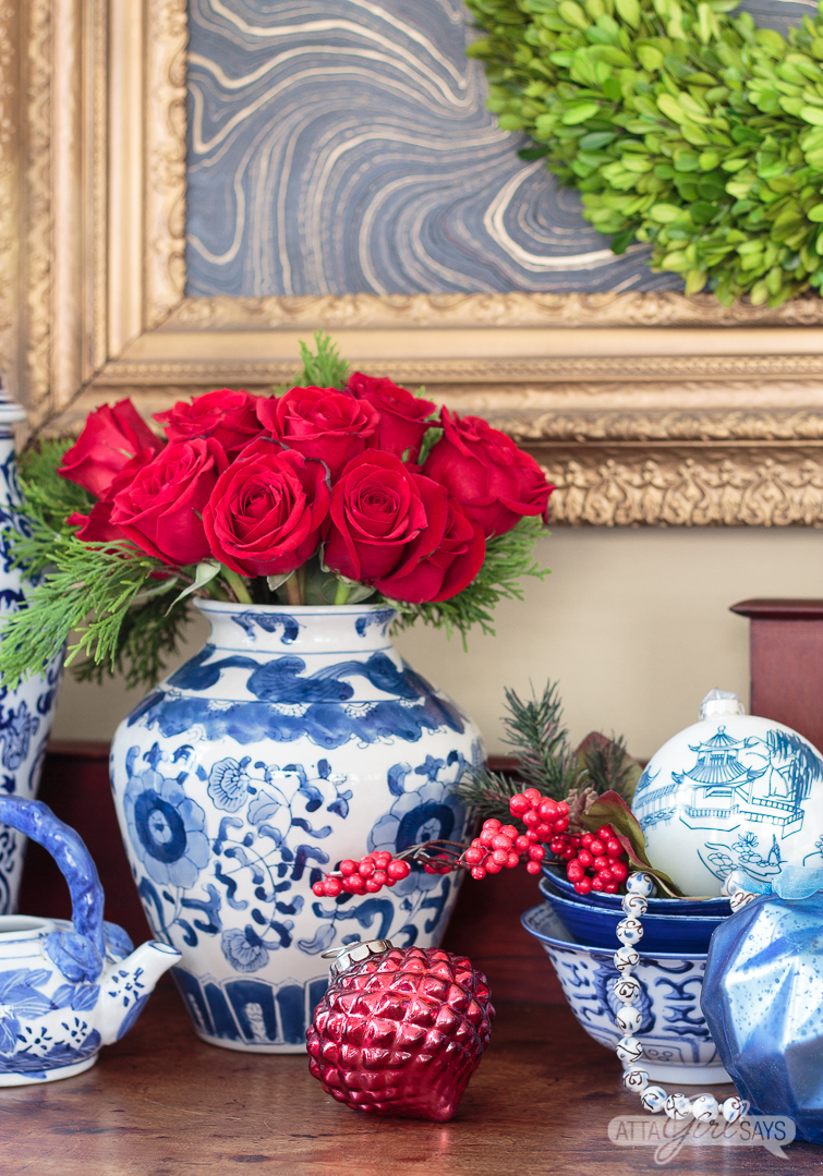 empire style buffet decorated with blue and white choinoiserie pottery for Christmas