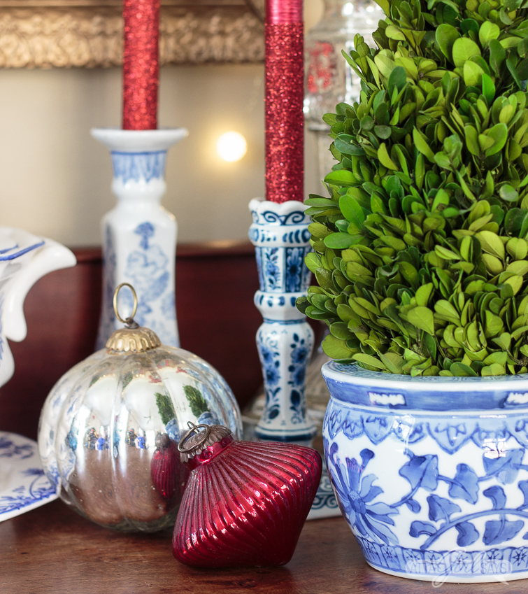 empire style buffet decorated with blue and white choinoiserie pottery for Christmas