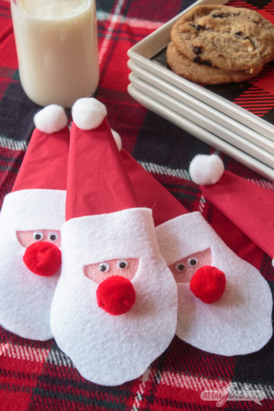 Felt Santa claus napkin rings on a holiday table