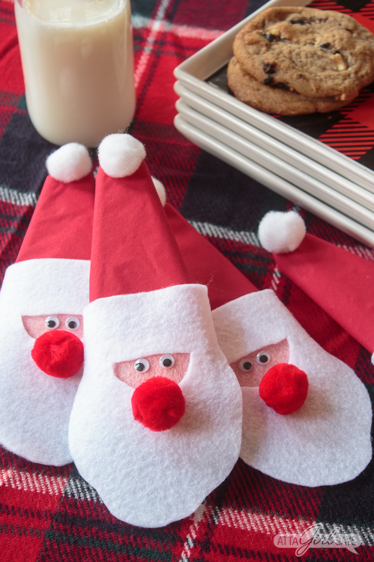 Felt Santa claus napkin rings on a holiday table