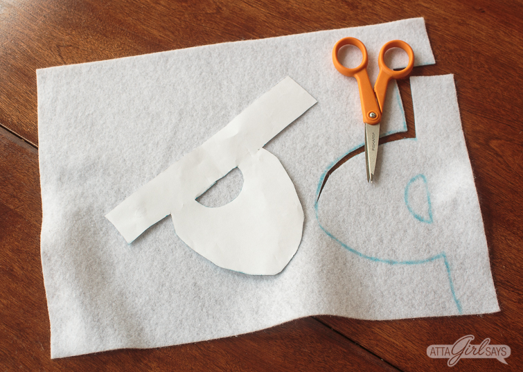 Tracing Santa beard pattern onto a piece of white felt