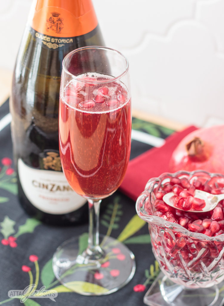 festive pomegranate mimosa made with prosecco