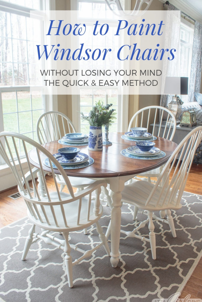 farmhouse style stained kitchen table with white legs and painted Windsor dining chairs