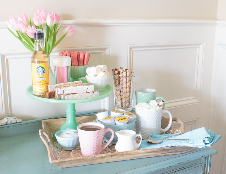 coffee bar with colorful pastel mugs and serving pieces
