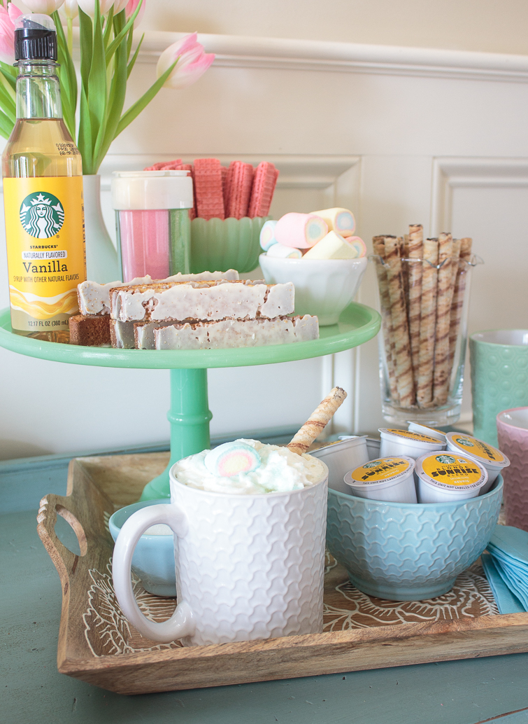 spring coffee bar set up on a tray and a jadeite cake stand
