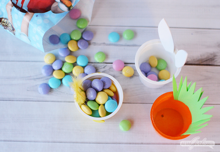 filling recycled K cups with Easter M&Ms candies