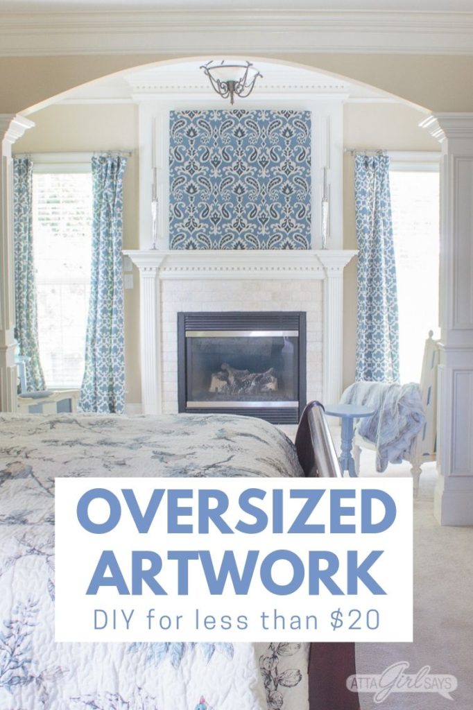 sitting room with a fireplace with blue artwork over the fireplace