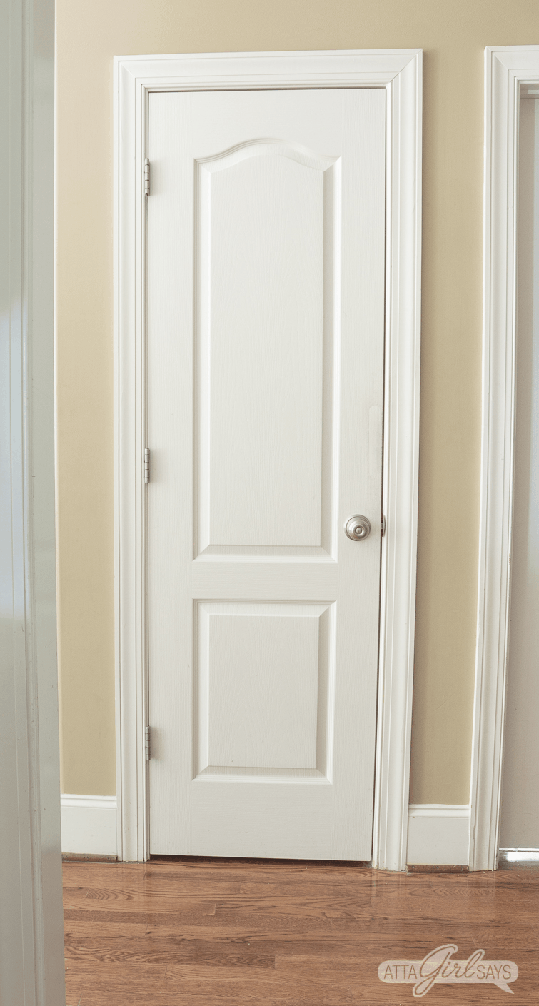 animated gif of a small organized pantry with pull-out shelving