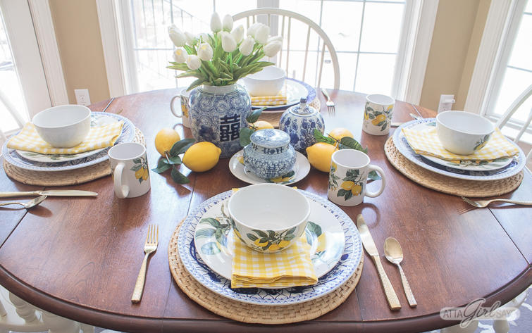 table set with Blue Willow china and Dollar Tree lemon plates