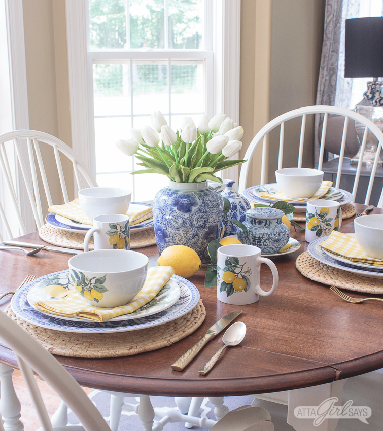 table set with Blue Willow china and Dollar Tree lemon plates