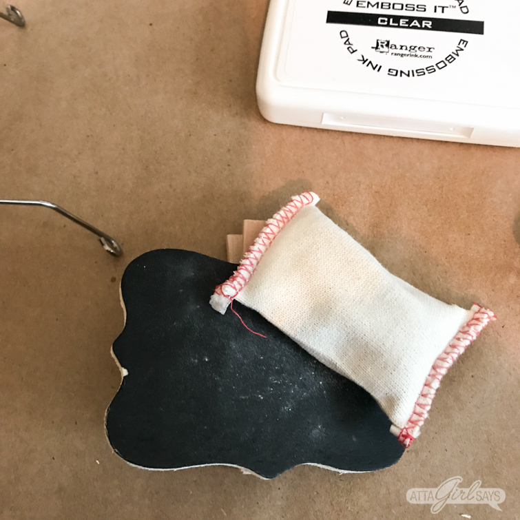 preparing a chalkboard surface for embossing with an embossing buddy