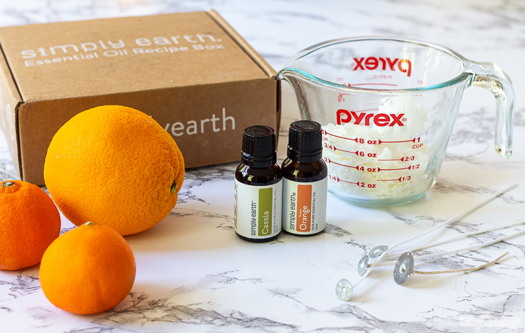 oranges, essential oils and soy wax from the Simply Earth box to make orange candles