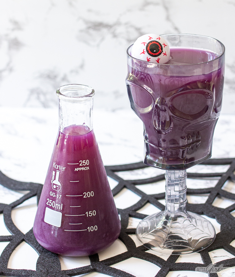 purple Halloween punch in a skeleton goblet