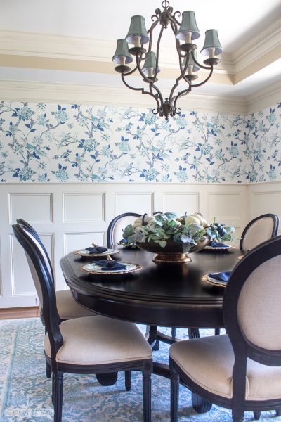 blue and aqua floral toile wallpaper in a dining room
