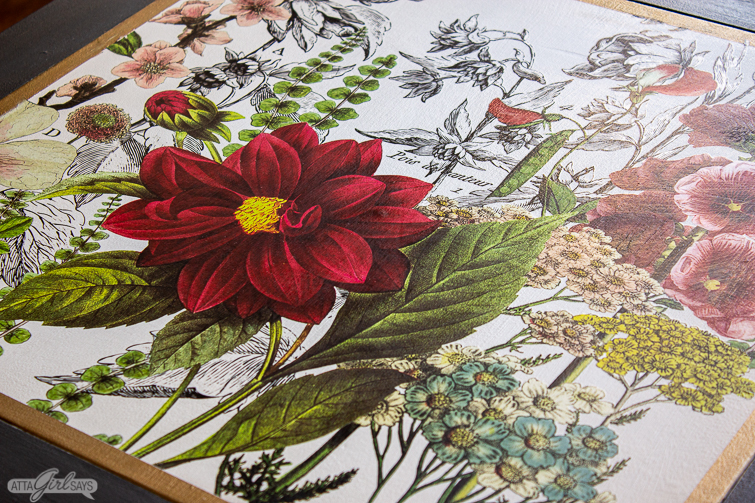 game table with a floral rub-on decorative transfer