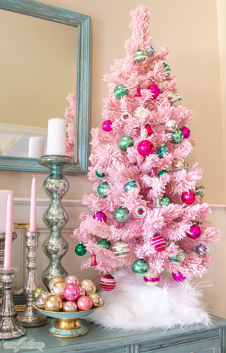 pink flocked tree with pink and green vintage Shiny Brite onrnaments
