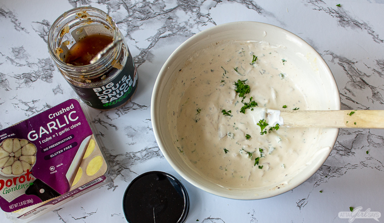 bowl of homemade French onion dip with fresh parsley