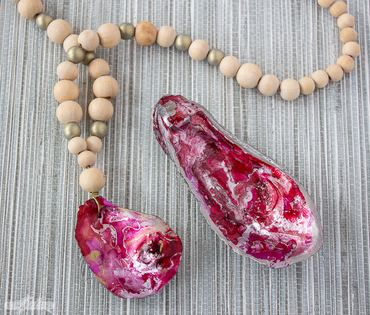 pink and red alcohol ink oyster shell necklace and jewelry dish