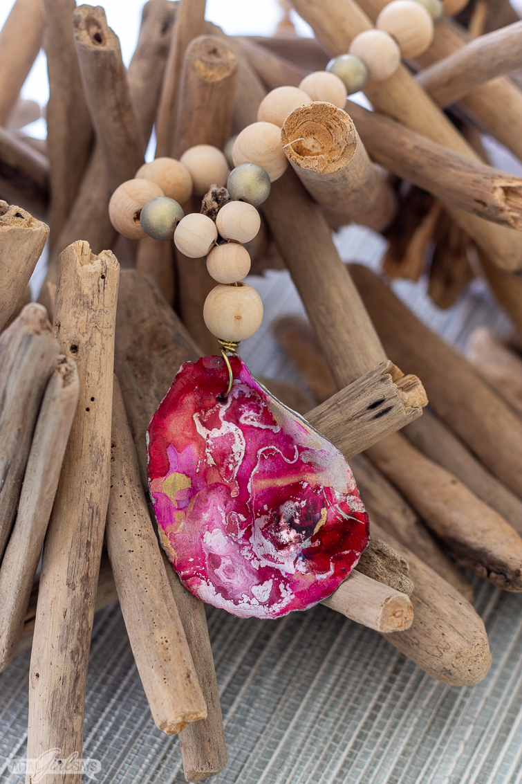 pink and red alcohol ink oyster shell pendant necklace