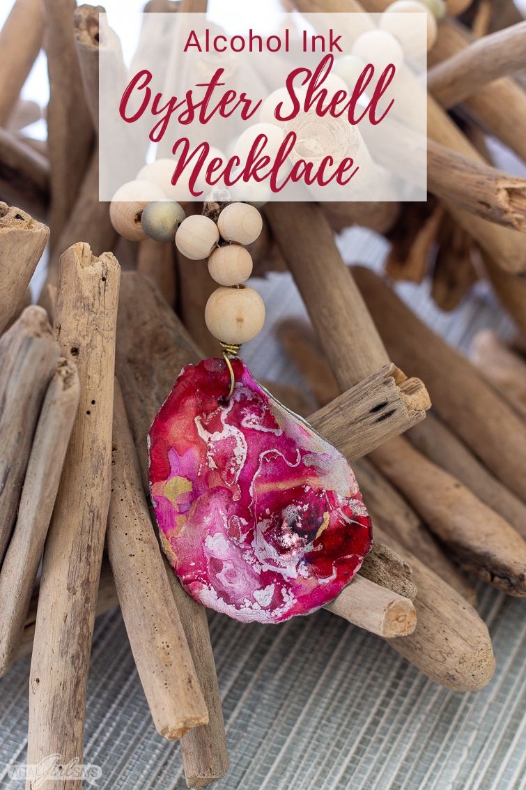 pink and red alcohol ink oyster shell pendant necklace