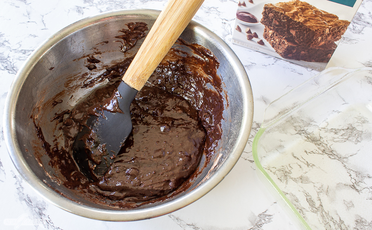brownie batter in a stainless steel bowl
