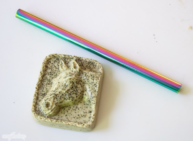 horse soap and a metal straw