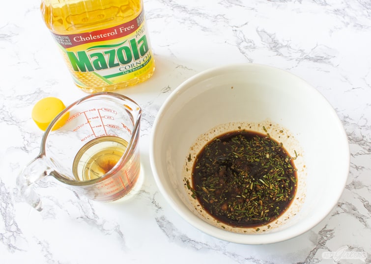balsamic vinegar marinade in a bowl with corn oil