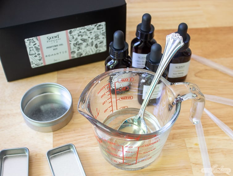 fragrance oils, tins and carrier oils to make solid perfume