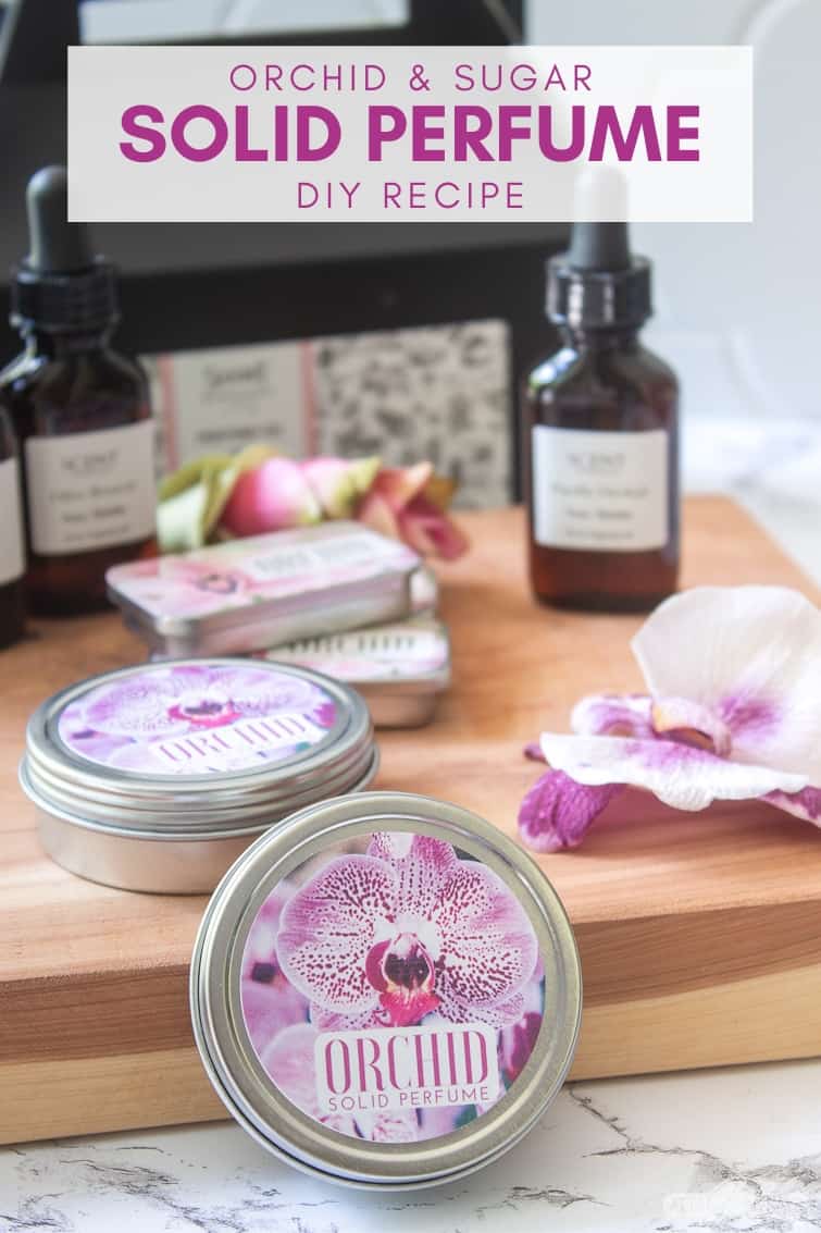 tins of homemade solid perfume with orchid fragrance oil