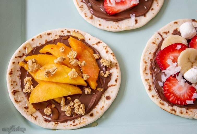 Peach slices, granola and Nutella on a mini street taco