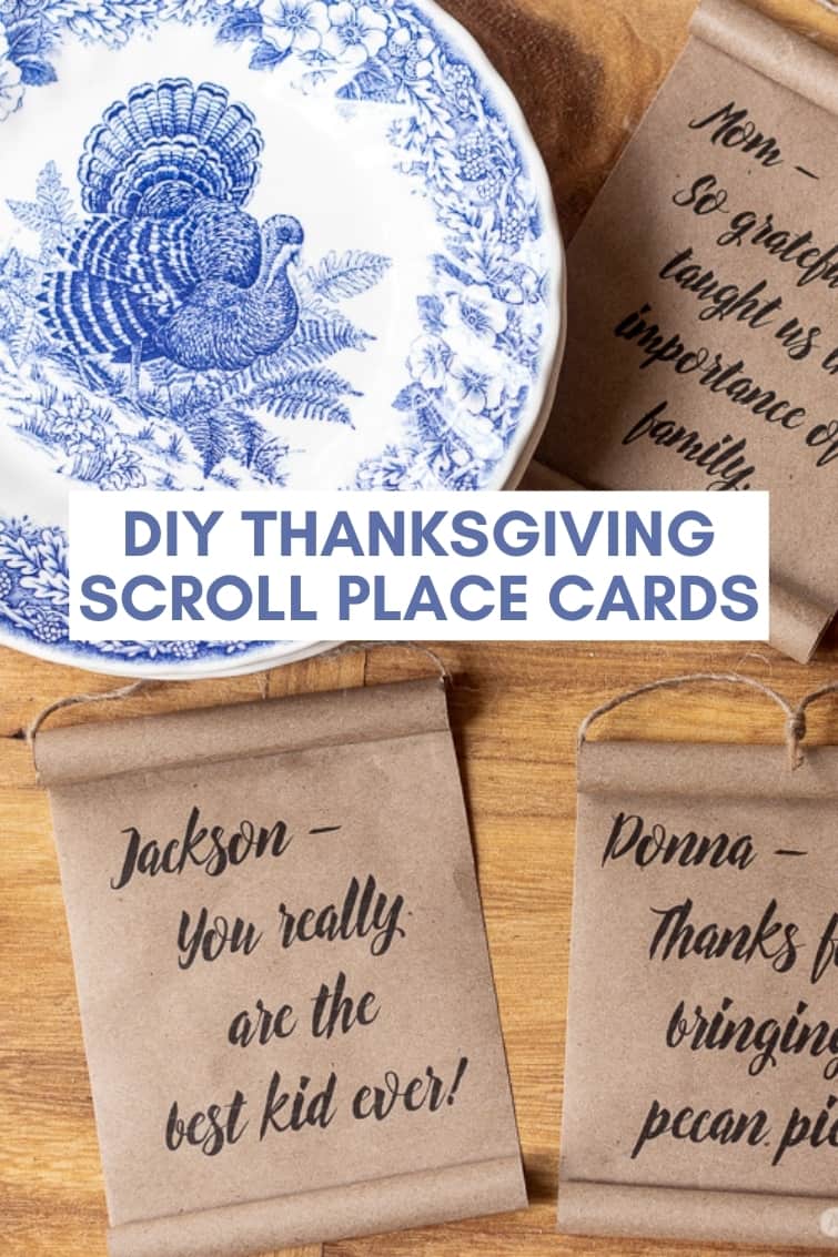 mini farmhouse scrolls and a blue and white turkey plate surrounded by DIY Thanksgiving place cards