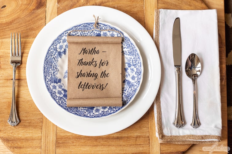 mini kraft paper scroll on a blue and white plate 