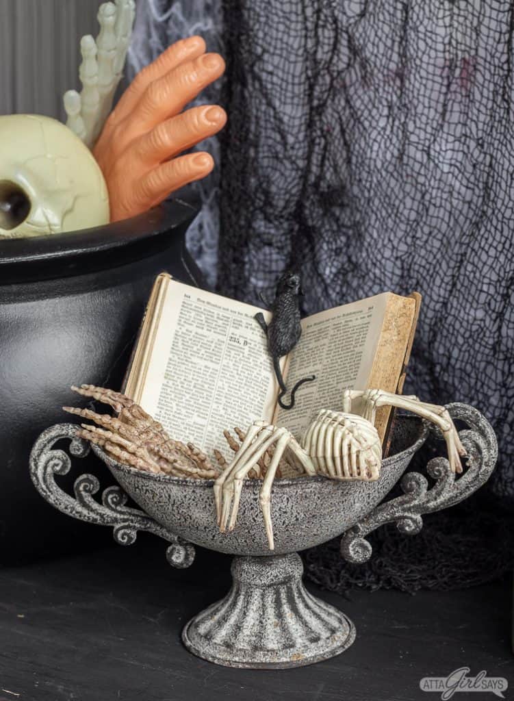 spell book and skeletons Halloween decor