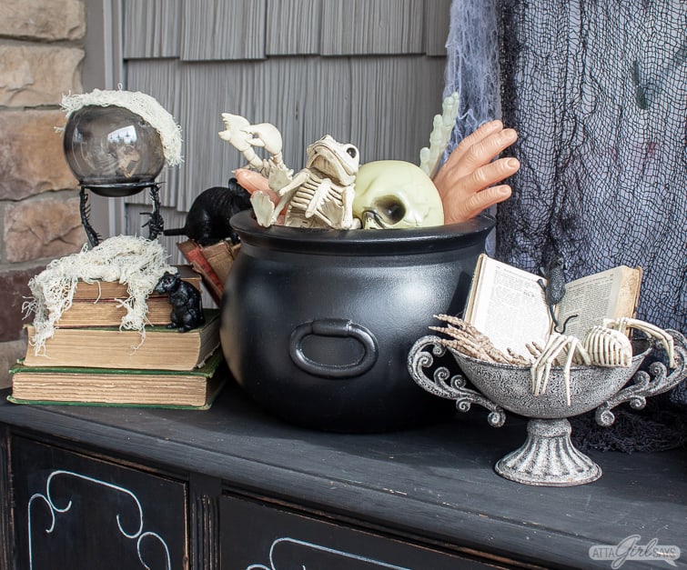 cauldron and crystal ball and witch's spell book Halloween decorations