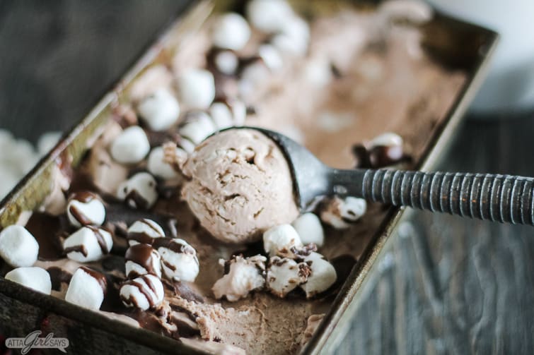 ice cream scoop serving frozen hot chocolate ice cream with marshmallows