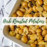 roasted potatoes with capers and olives in a white baking dish