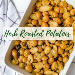 roasted potatoes with capers and olives in a white baking dish