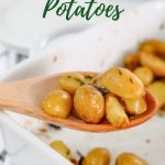 wooden spoon serving baby potatoes