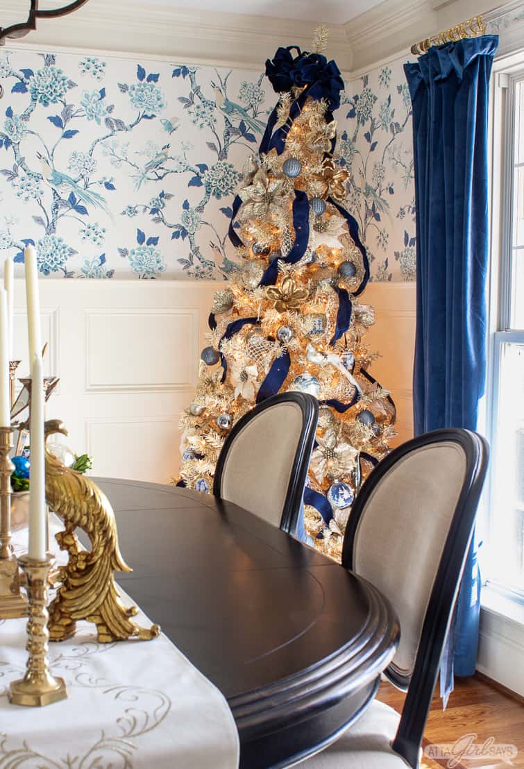 formal dining room decorated for Christmas with blue chinoiserie