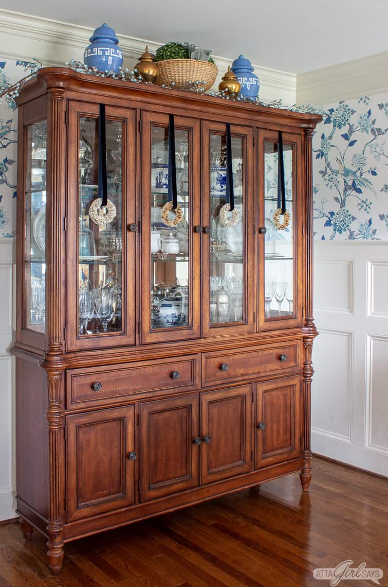 French style china cabinet with glass doors decorated for Christmas
