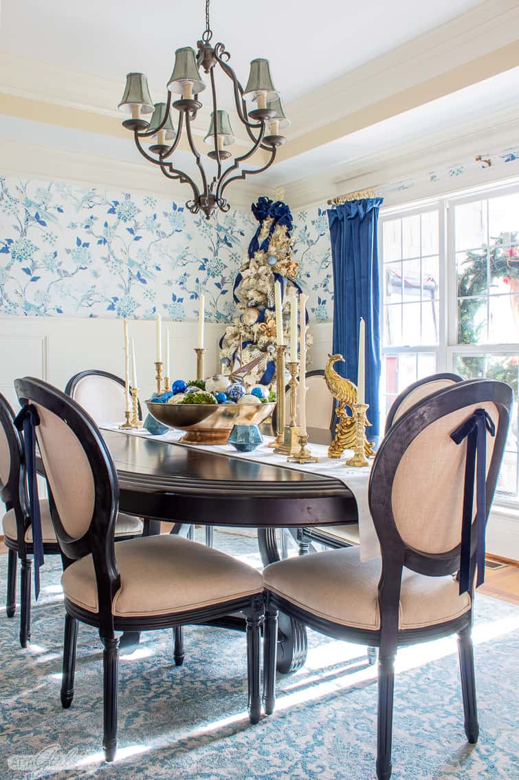 formal dining room decorated for Christmas with blue chinoiserie