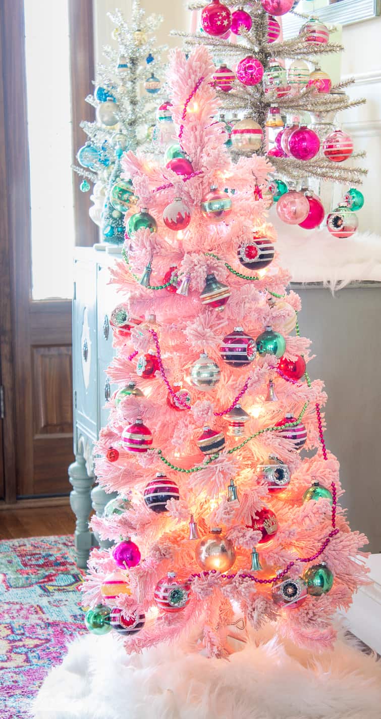 pink flocked tree decorated with vintage and reproduction pink and green Shiny Brite ornaments