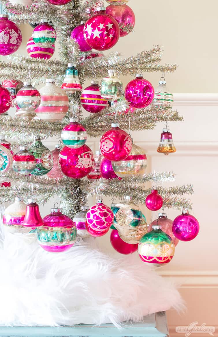 silver tinsel tree decorated with pink and green Shiny Brite ornaments