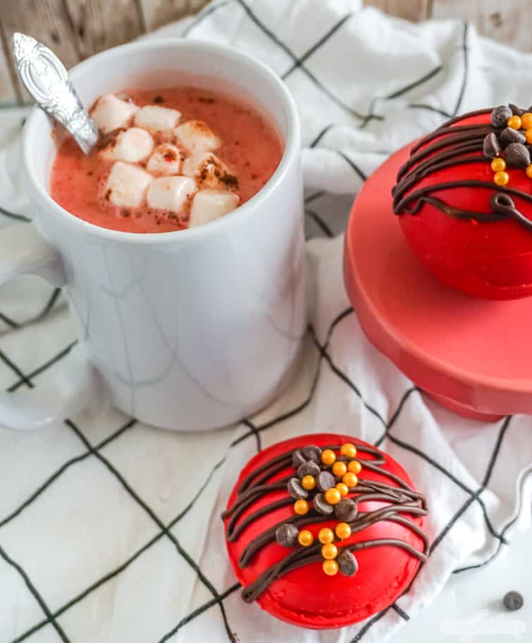 mug of red velvet hot chocolate with homemade hot cocoa bombs
