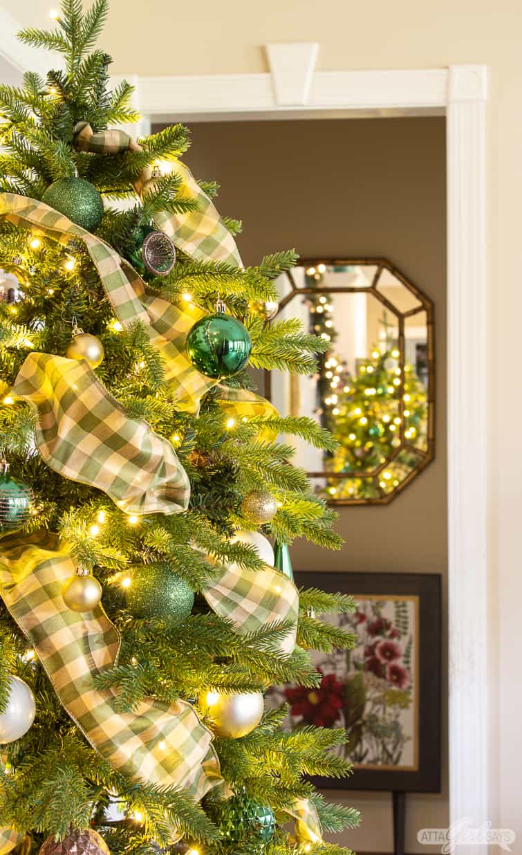Christmas tree reflected in a faux bamboo mirror